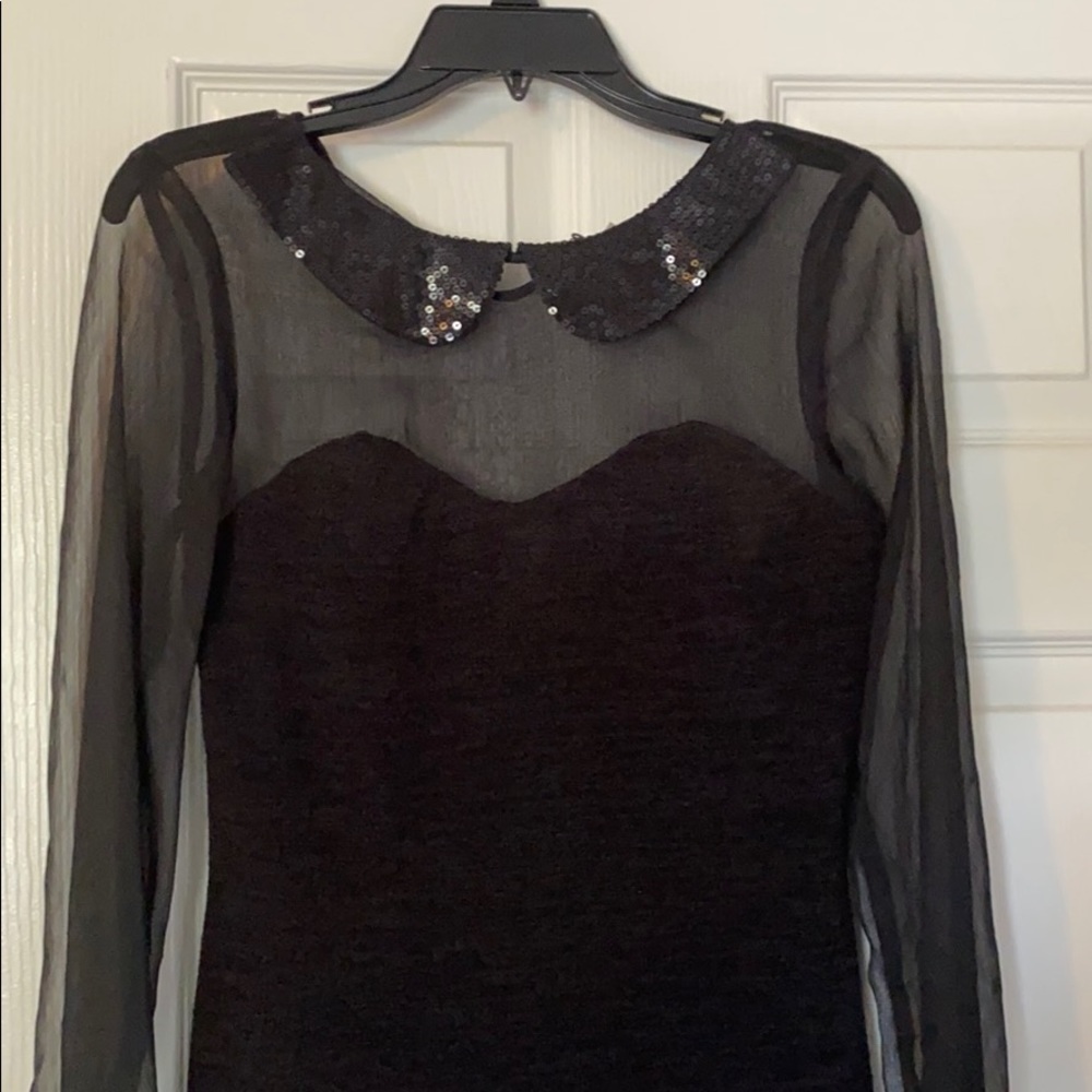Little black dress with sequins collar and cuffs